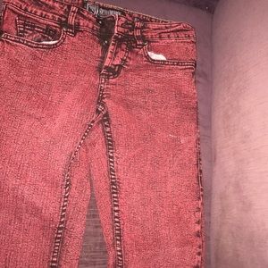 Red acid wash skinny jeans